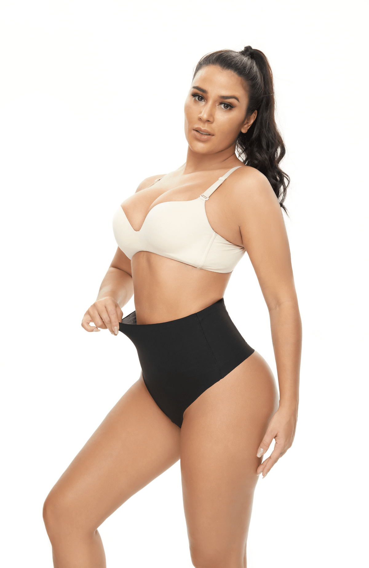Model wearing black high-waist thong shapewear